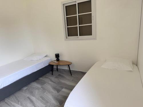 Postel nebo postele na pokoji v ubytování Gîtes Royal passion
