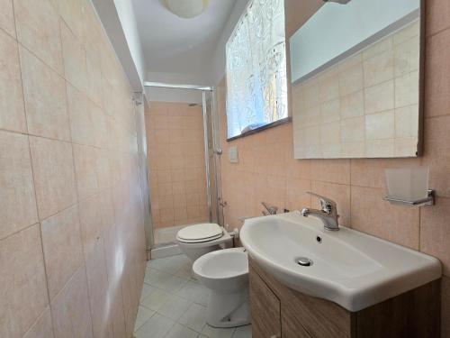 Ένα μπάνιο στο Sweet Sun Sorrento Coast Apartments