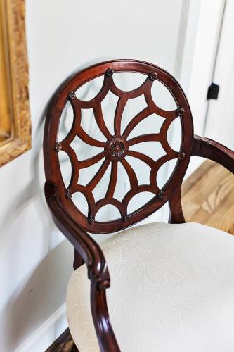 a wooden chair with a white seat in a room at Elmwood Park Retreat Renovated 3 Bed 2 Bath DT in Columbia