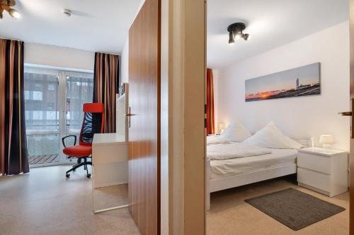 Postel nebo postele na pokoji v ubytování Wohnung 2 Haus Deichblick