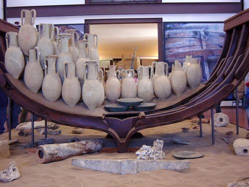 a group of white vases sitting on a table at Case Vacanze Terra Sinus in Terrasini