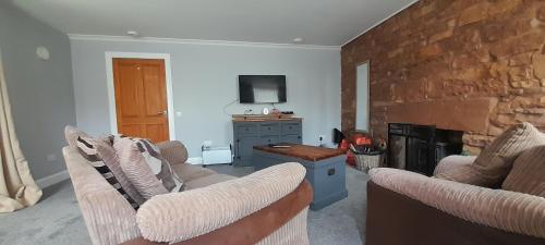 Χώρος καθιστικού στο Valhaven Apartment 1