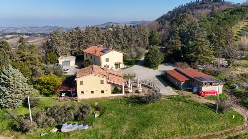 an aerial view of a house on a hill at Agriturismo CA DECIO in Cesena