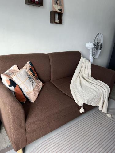 Posezení v ubytování Tiny Haven Room