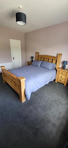 Ένα ή περισσότερα κρεβάτια σε δωμάτιο στο Cosy Family home