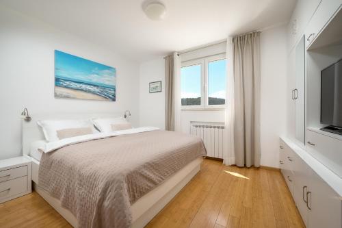 Postel nebo postele na pokoji v ubytování Comfortable Apartment