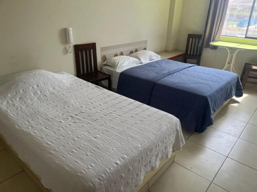 Katil atau katil-katil dalam bilik di Hostal Skyblue