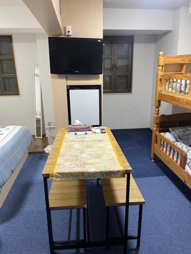 Postel nebo postele na pokoji v ubytování ひまわりHotel
