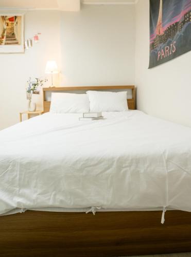 The Shim Anam 3rooms late check in-outにあるベッド
