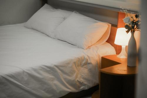 The Shim Anam 3rooms late check in-outにあるベッド