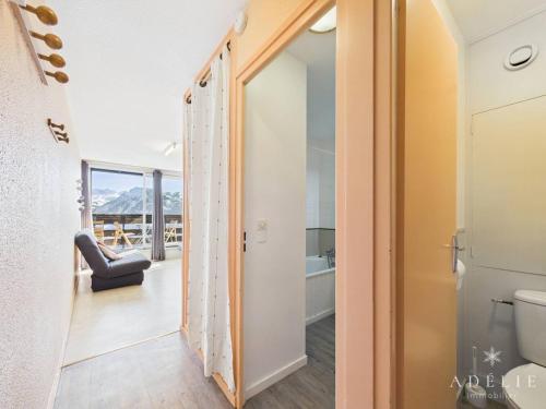 a bathroom with a sliding door leading to a balcony at Studio confortable au centre, proche remontées mécaniques - FR-1-398-573 in Montvalezan