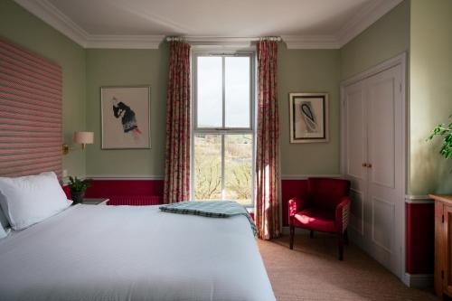 Ένα ή περισσότερα κρεβάτια σε δωμάτιο στο The Fell Hotel