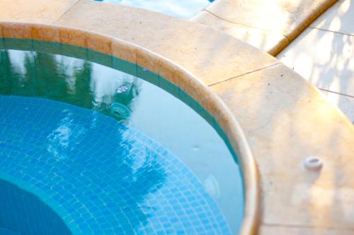 a close up of a swimming pool at Dar tal-Kaptan Boutique Maison in Għasri