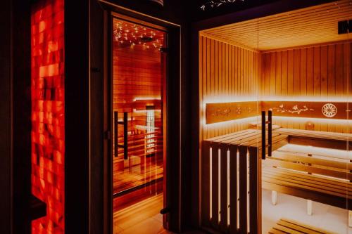 a sauna with a view of a room at Pensjonat Jurkowski Wellness & Spa in Ochotnica Dolna