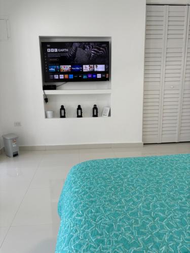 Lova arba lovos apgyvendinimo įstaigoje Posada Centric Studio Isla Verde