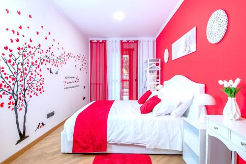 Postel nebo postele na pokoji v ubytování Red Chic Roma