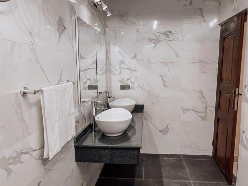 Ένα μπάνιο στο Pôlinéo Résidence