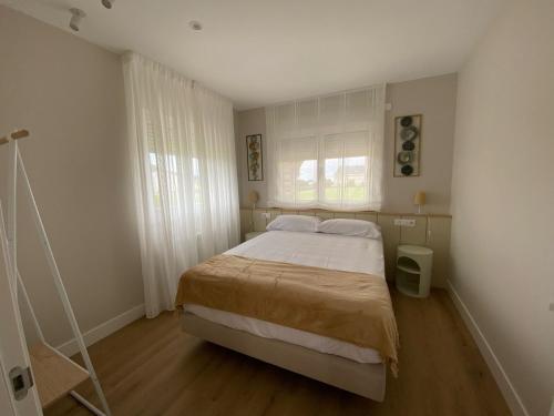 Postel nebo postele na pokoji v ubytování Casa das Indias