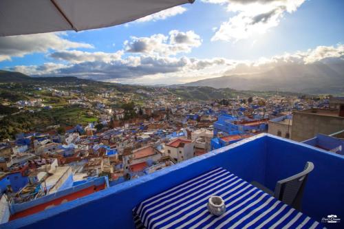 a view of the blue city from a balcony at Casa Sanae in Chefchaouene