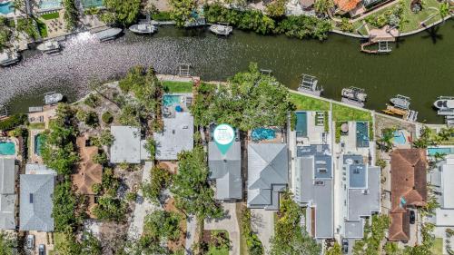 an aerial view of a house with a river at Villa Champagne - 5322 in Siesta Key