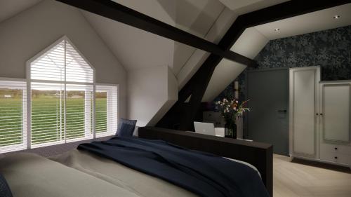 a bedroom with a large bed and a large window at Hotel - restaurant Hoeve Kromwijk in Zoetermeer