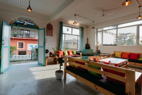 a living room with a ping pong table at The Hood in Bīr