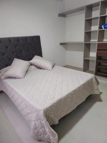Katil atau katil-katil dalam bilik di Casa entera familiar AMY, cómoda y acogedora