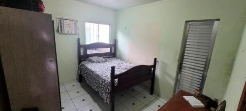 Ein Bett oder Betten in einem Zimmer der Unterkunft Casa para Cop30