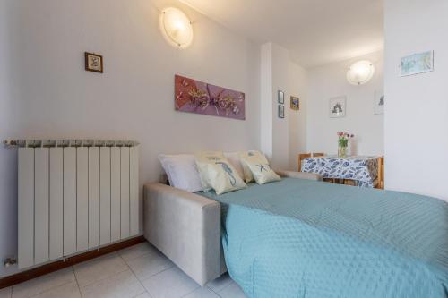 Postel nebo postele na pokoji v ubytování GuestHost - Comfortable Apartment with Sea View