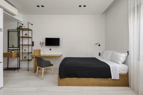 Posteľ alebo postele v izbe v ubytovaní MELIGEO Suites Center of IOANNINA