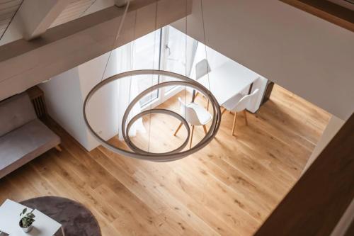 a glass table in the middle of a room at VK - H - Zürich Airport - Luxury - Homestay - Haldenstrasse - Kloten in Kloten