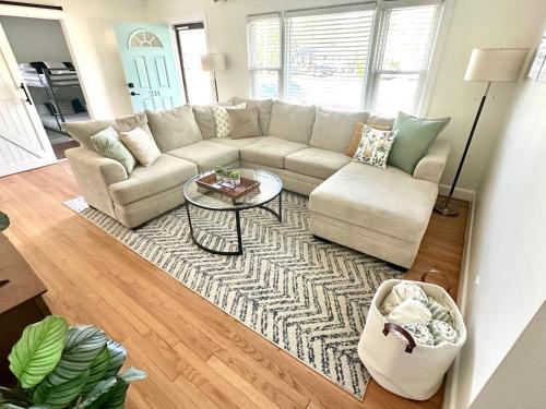 a living room with a couch and a table at Pack your bags and leave tonight! in Wilmington