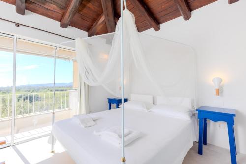 Ένα ή περισσότερα κρεβάτια σε δωμάτιο στο Casa Luce