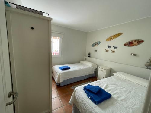 Postel nebo postele na pokoji v ubytování Villa René Beach