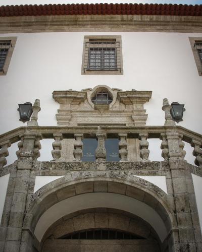 an archway of a building with a window at MS Collection Arouca - Mosteiro de Arouca in Arouca