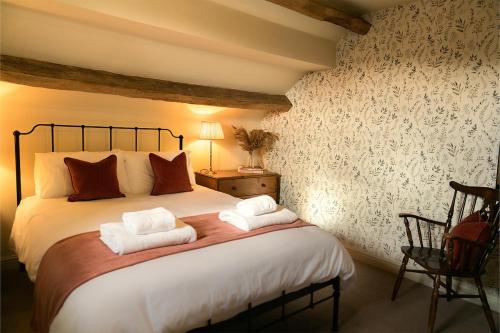 Postel nebo postele na pokoji v ubytování Hickory Cottage