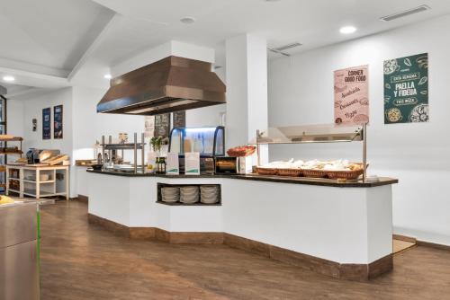 Kuchyň nebo kuchyňský kout v ubytování Aparthotel Ona Cala Pi Club
