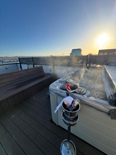 a hot tub on top of a roof at James Clow Bed & Breakfast in Belfast