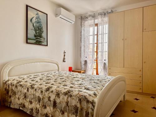 Postel nebo postele na pokoji v ubytování holidaycasa Leone - Con posto auto a 200mt dal Mare