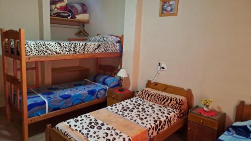 Ένα ή περισσότερα κρεβάτια σε δωμάτιο στο Residencial Guadalupe