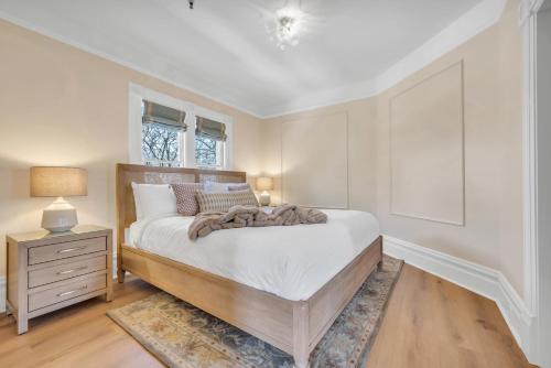 a bedroom with a large bed and a night stand at Hennessey Estate in Napa