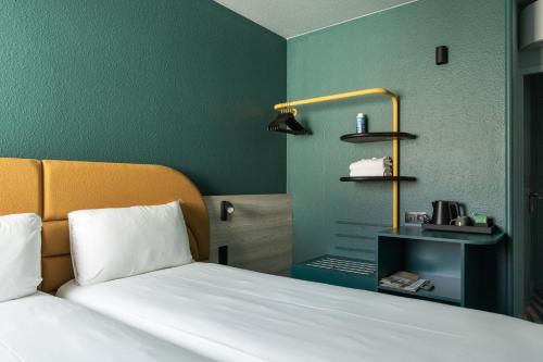 Postel nebo postele na pokoji v ubytování ibis Styles Brugge Centrum