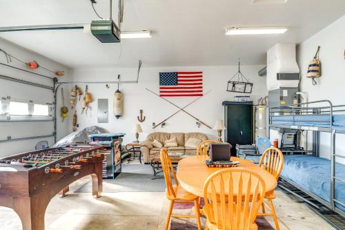 a room with a ping pong table and a bed at Pet-Friendly Westport Vacation Rental with Hot Tub! in Westport
