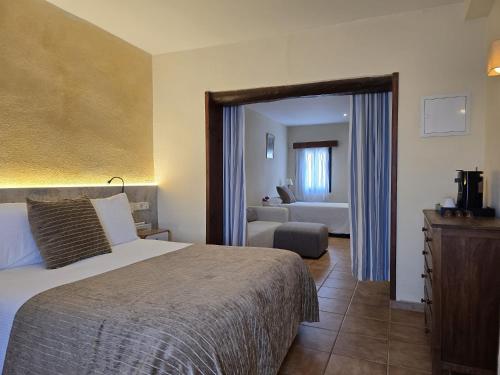 Posteľ alebo postele v izbe v ubytovaní Hotel Sant Joan