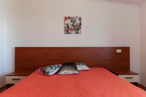 En eller flere senge i et værelse på Villetta Kair 260