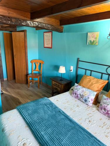 Postel nebo postele na pokoji v ubytování Vivienda Vacacional El Navariegu 1