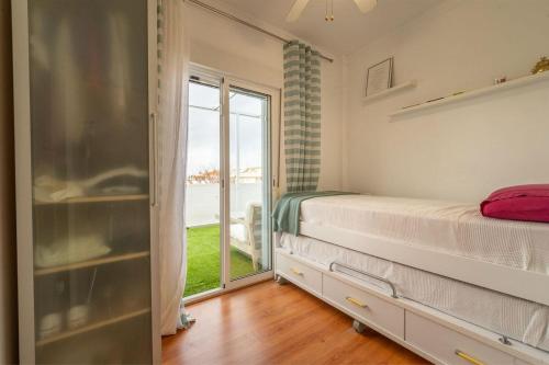 En eller flere senge i et værelse på Atico punta