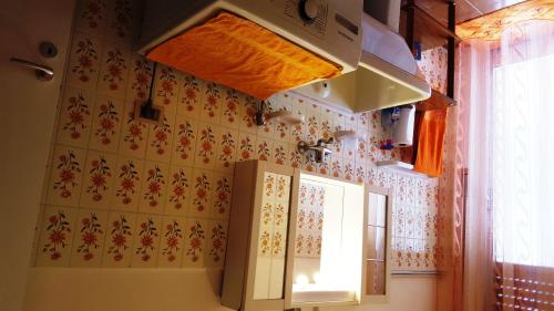 Кухня или мини-кухня в Appartamento Etna

