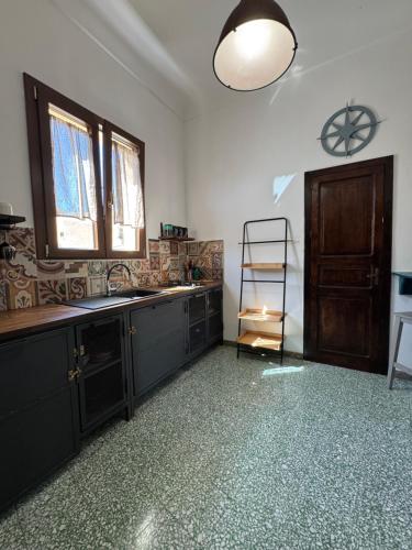Kuchyň nebo kuchyňský kout v ubytování Appartamento Porto Marina