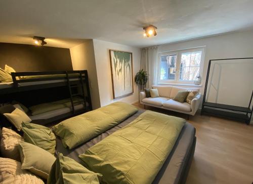 Postel nebo postele na pokoji v ubytování Tini House